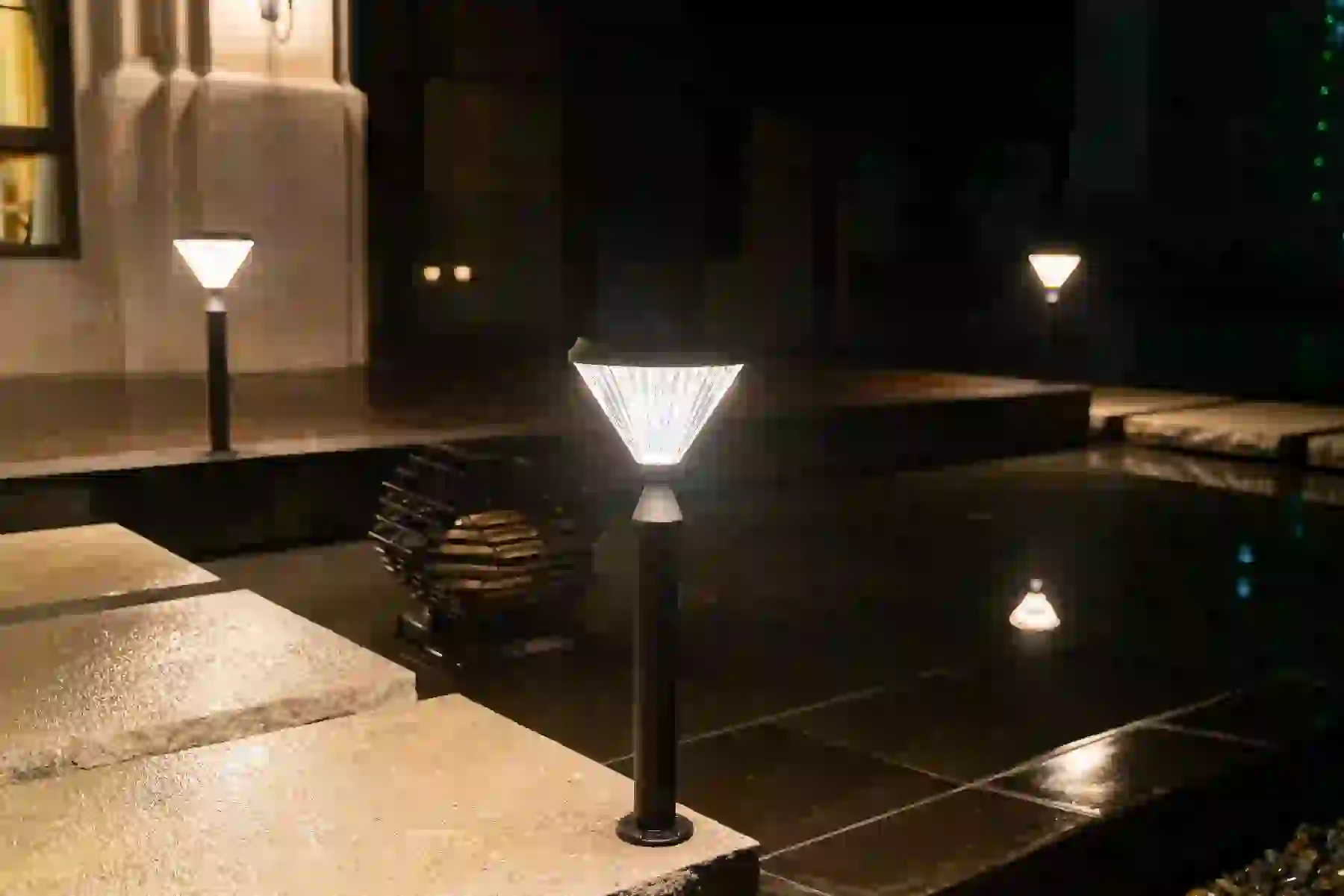 CPD-5405 solar light beside a patio seating area